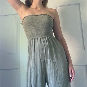 Green jumpsuit.
